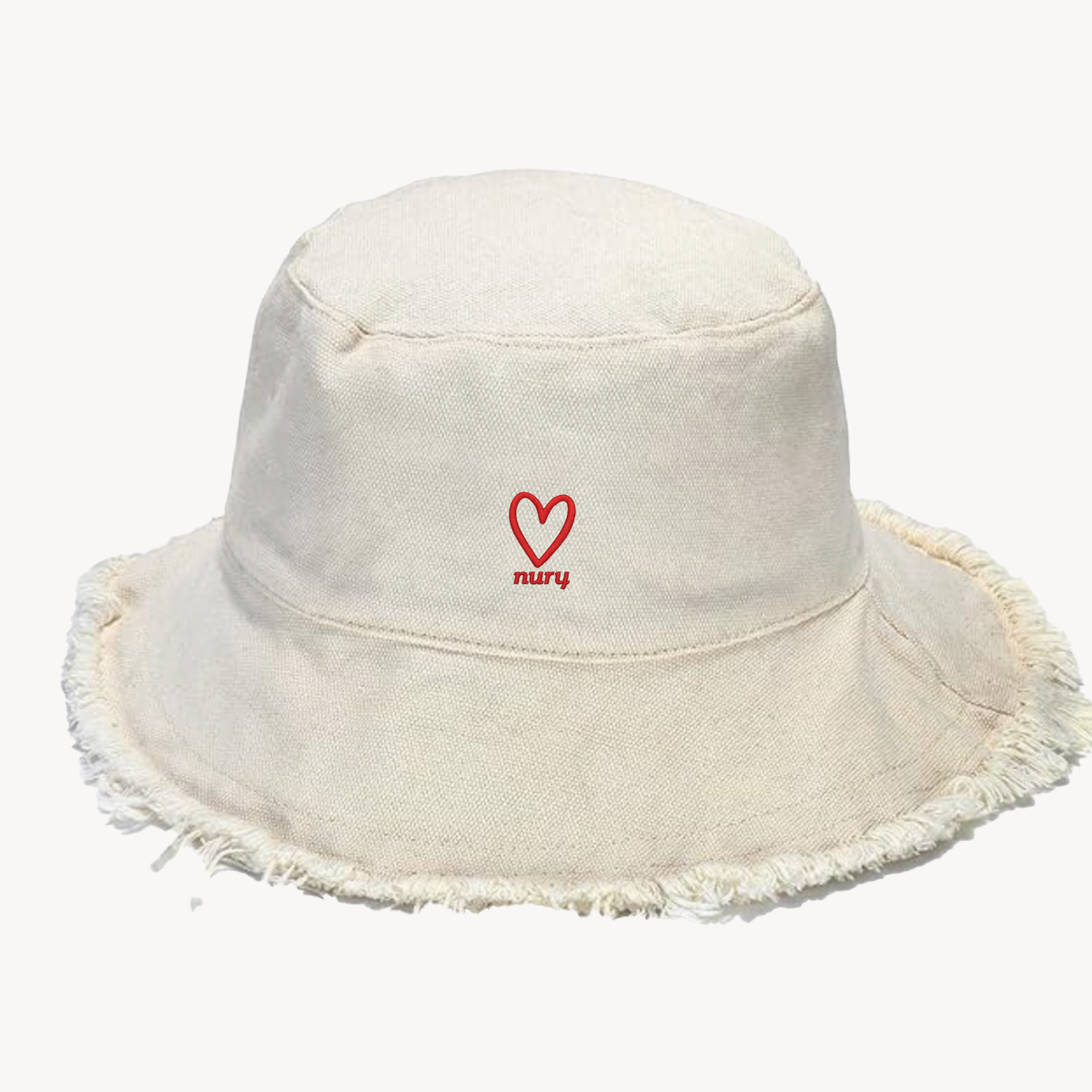 Frayed Edge Bucket Hat in Cream Denim with red heart embroidery